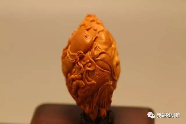 我是橄榄核雕刻师小火炉刘向前