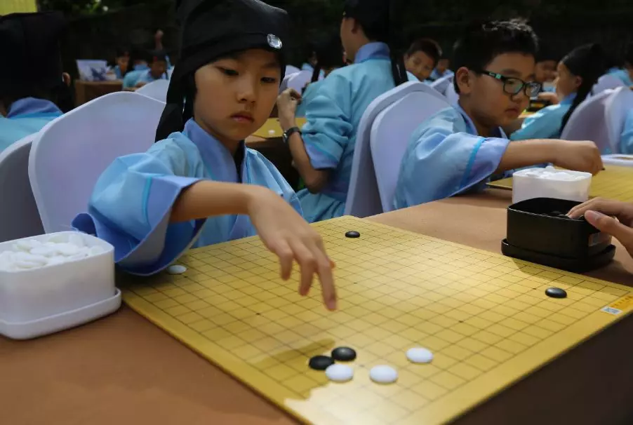传承|世界冠军指导围棋小棋手