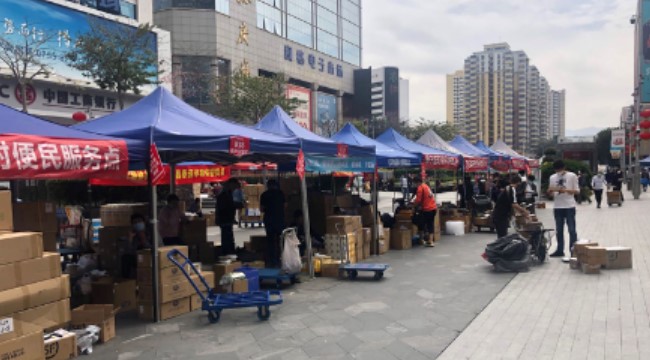 华强北“开市”后，商家为多卖台手机拼成了这样-锋巢网